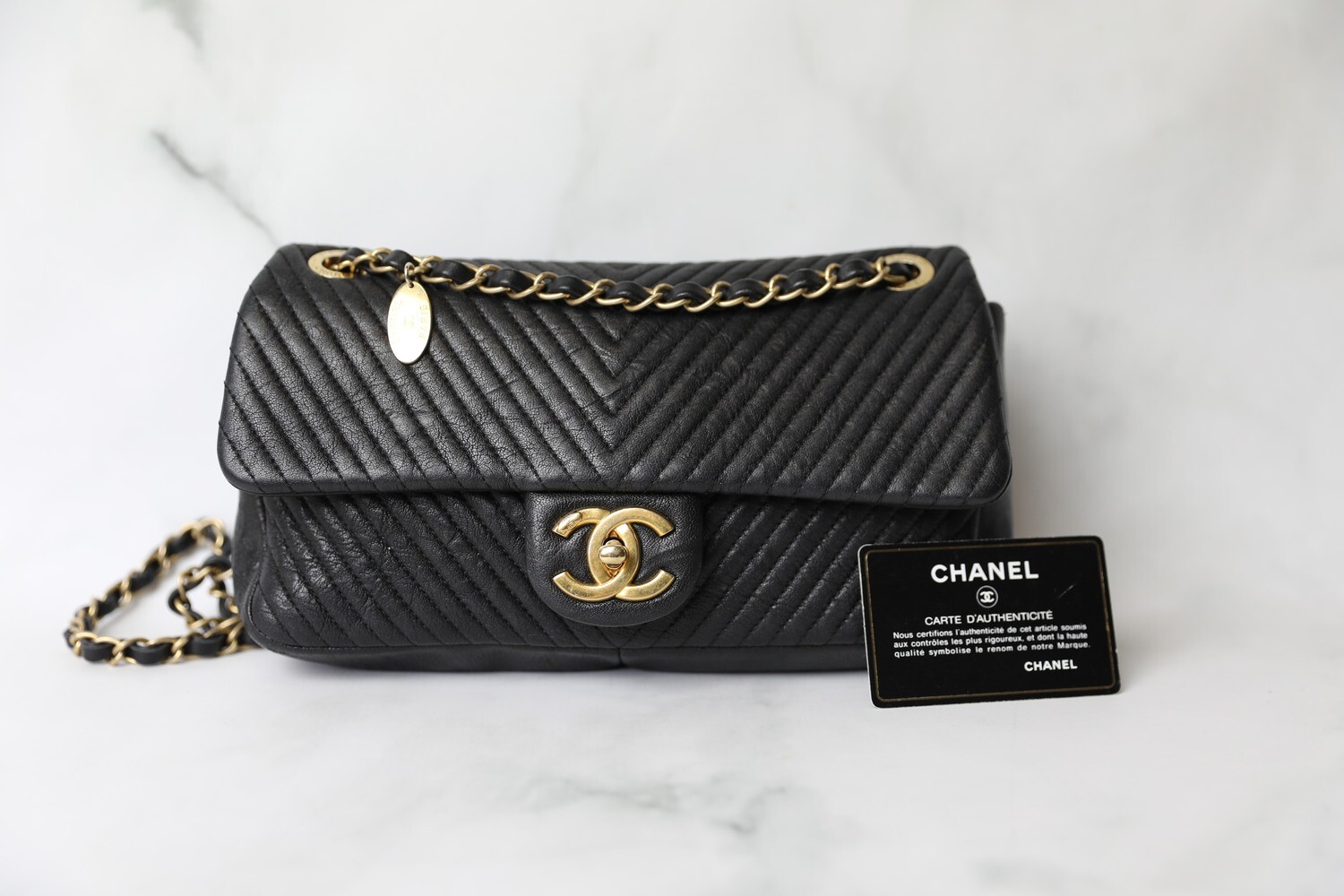 Chanel Seasonal Flap, Black Chevron Calfskin with Gold Hardware, Preowned  in Dustbag WA001 - Julia Rose Boston