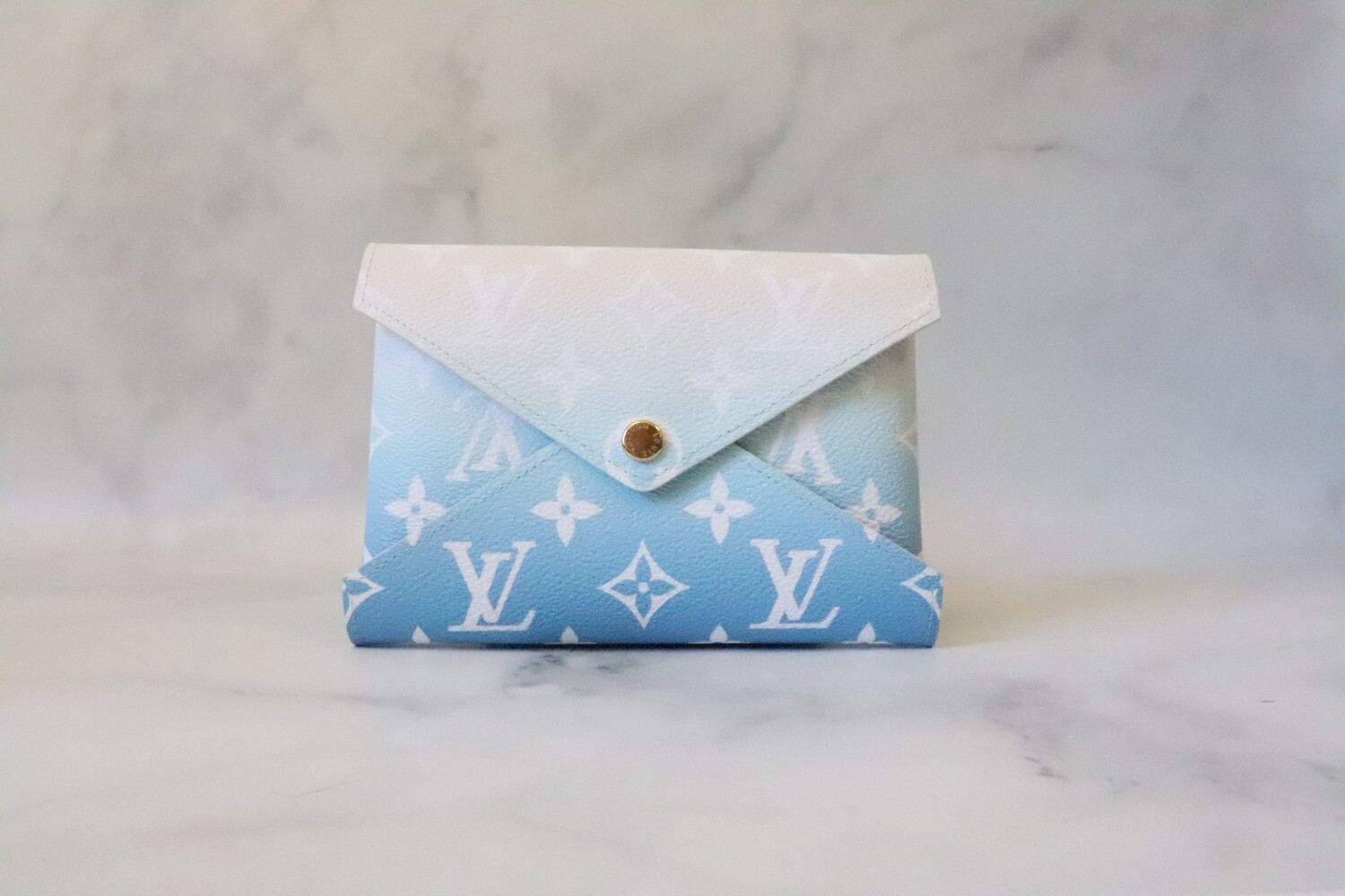 Medium clutch bag Kirigami By the pool Louis Vuitton Light blue