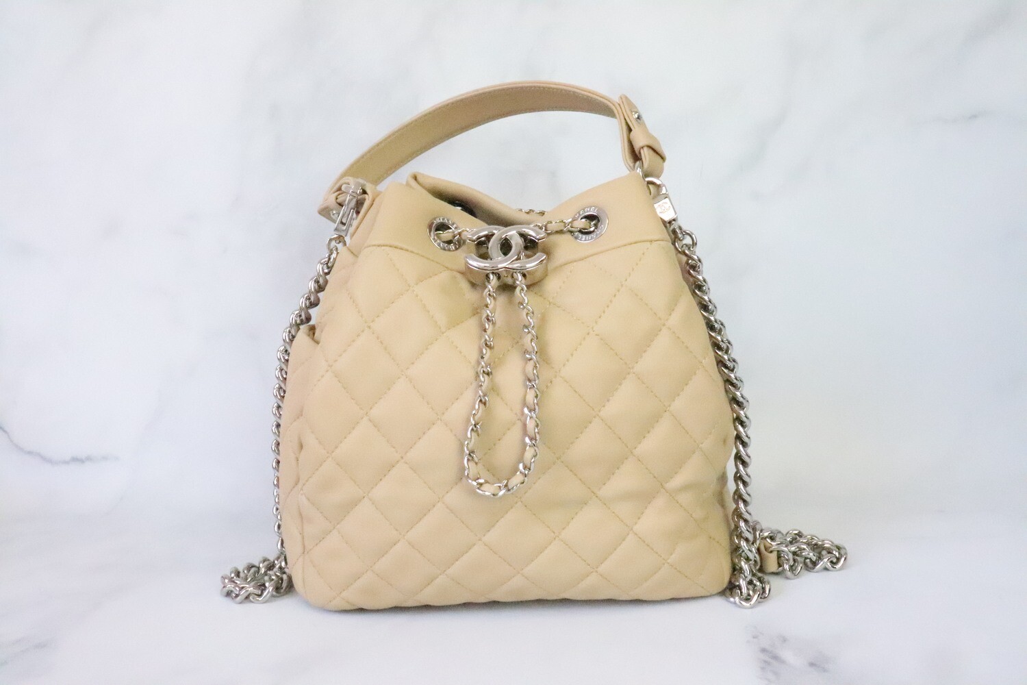 Chanel Bucket Bag, Beige Lamsbkin Leather, Silver Hardware, Preowned in Dustbag