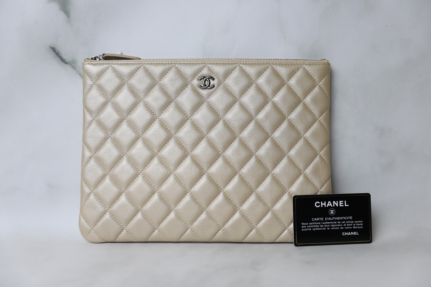 Chanel O Case, Iridescent Pearl Lambskin with Ruthenium Hardware, Preowned in Box WA001