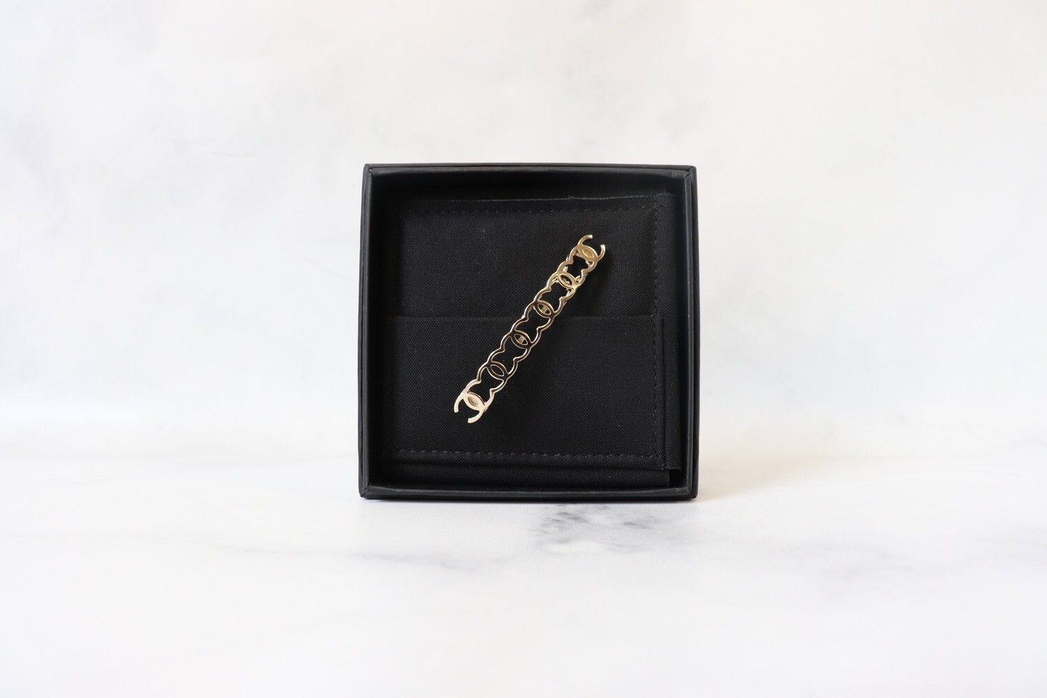 Chanel Hairclip Light Gold Repeating CC, New in Box