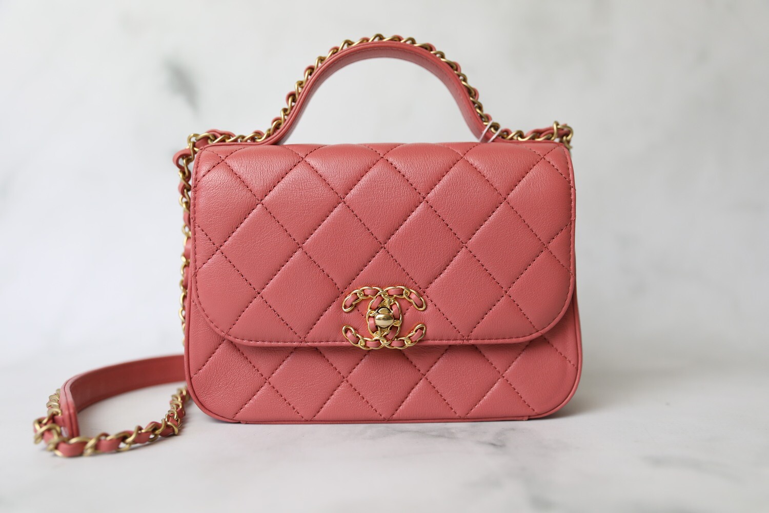 pink chanel flap bag with top handle