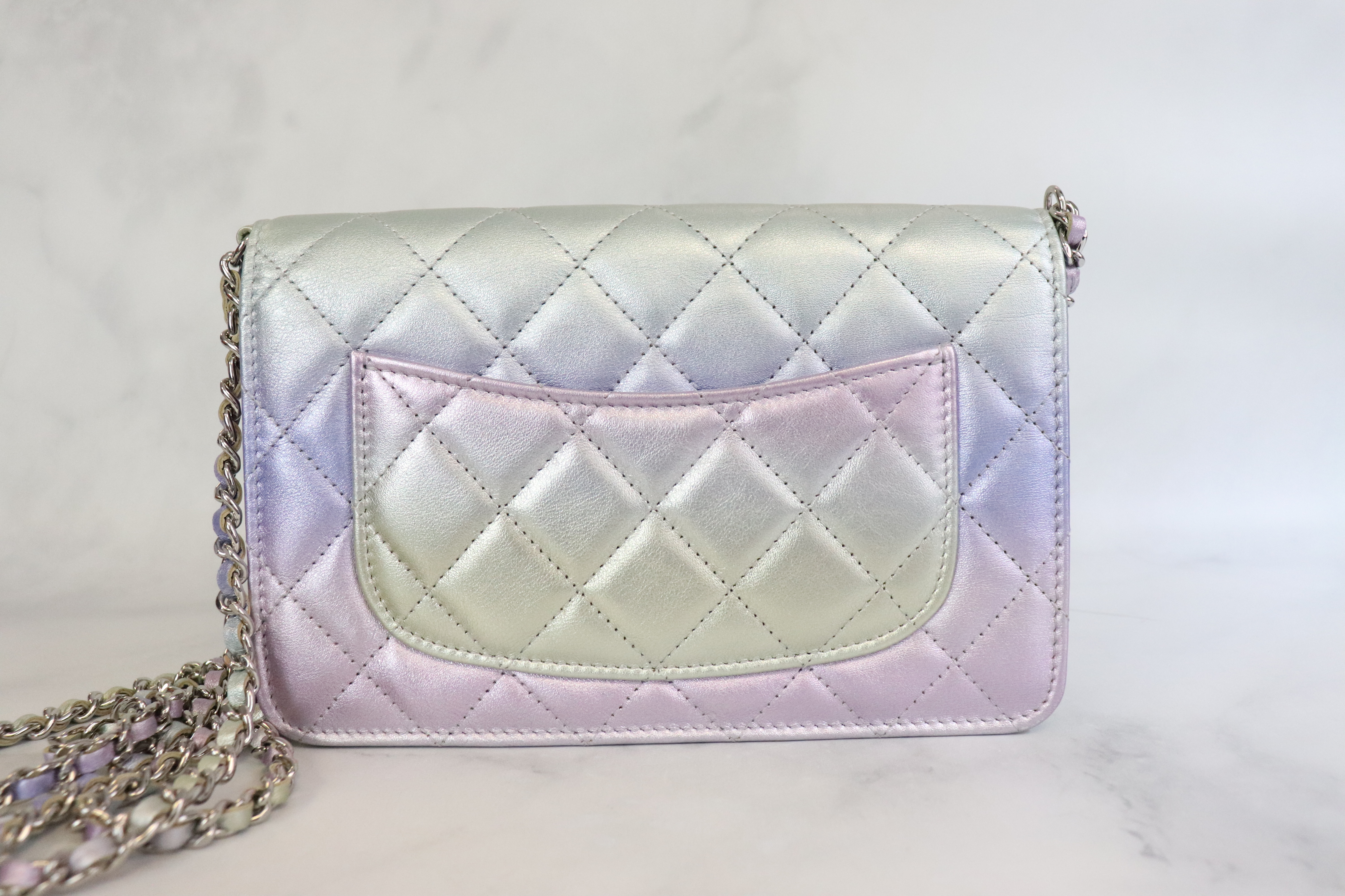 Holographic Chanel purse, IG: threadsstyling