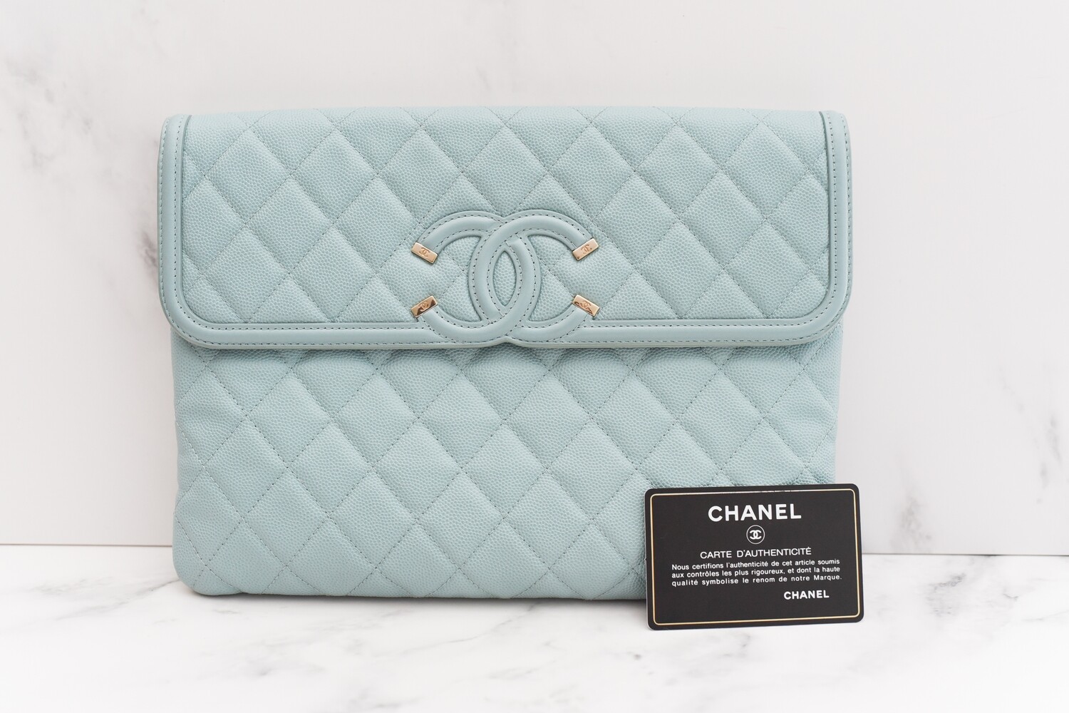 Chanel Filigree O Case Clutch, Light Blue Caviar Leather, Antique Gold Hardware, Preowned in Box - GA001