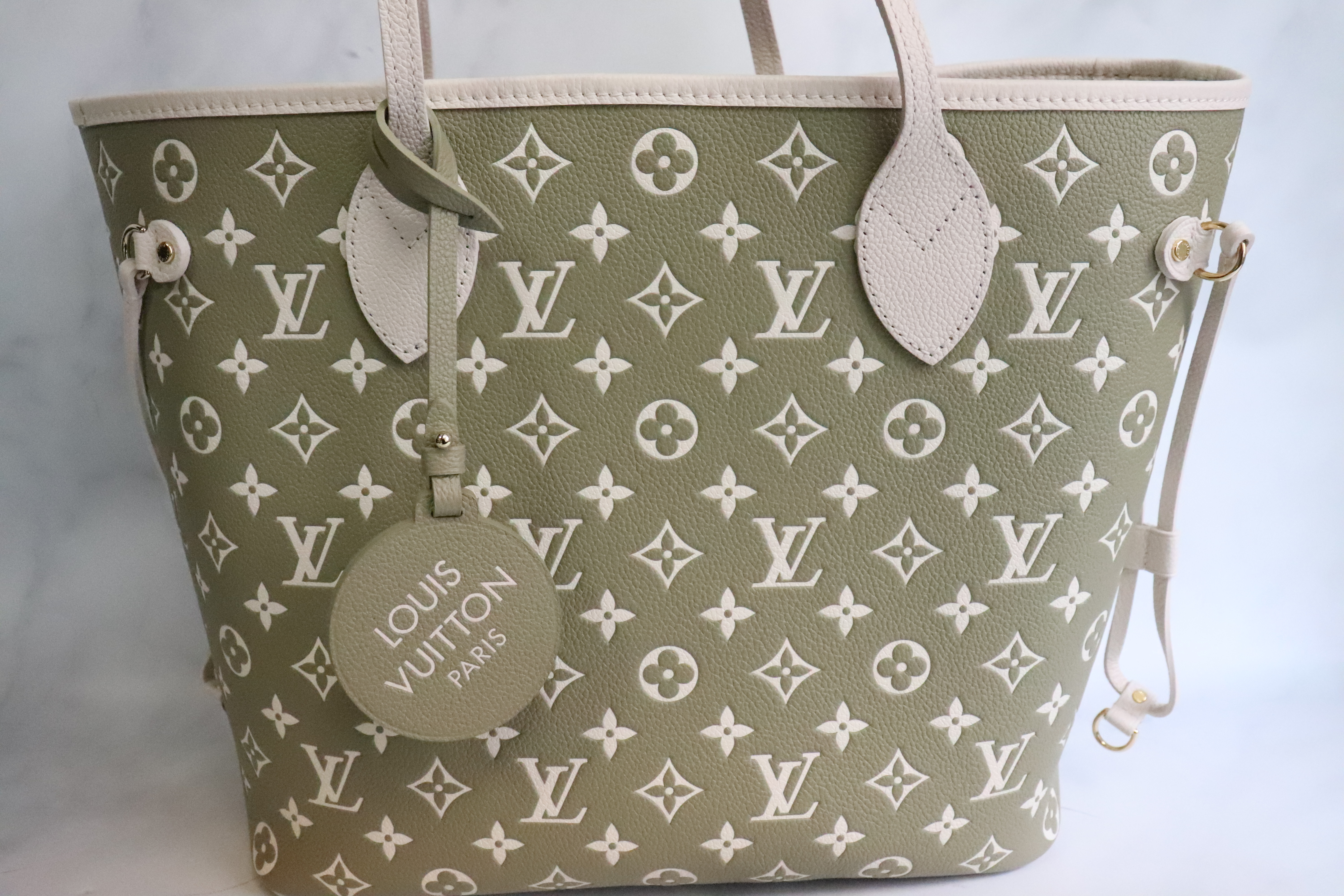 Louis Vuitton® Neverfull MM Khaki Cream. Size in 2023  Bags, Louis vuitton  neverfull mm, Monogrammed leather