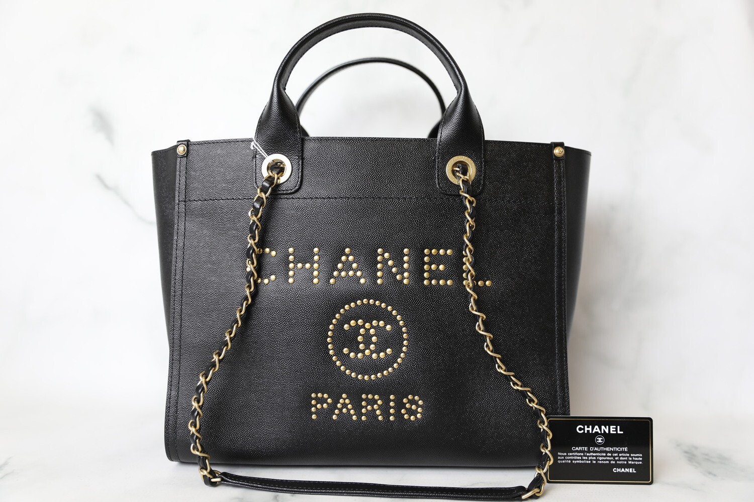 Chanel 2018 Black/Gold Caviar Leather Studded Small Deauville Tote Bag For  Sale at 1stDibs  chanel caviar small studded deauville tote black, chanel  deauville tote black leather, chanel deauville tote caviar
