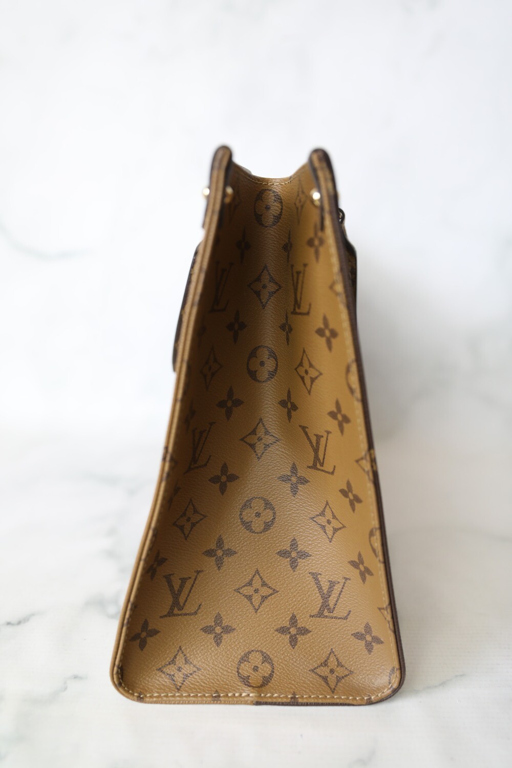 Louis Vuitton On The Go Reverse MM, Preowned in Dustbag WA001