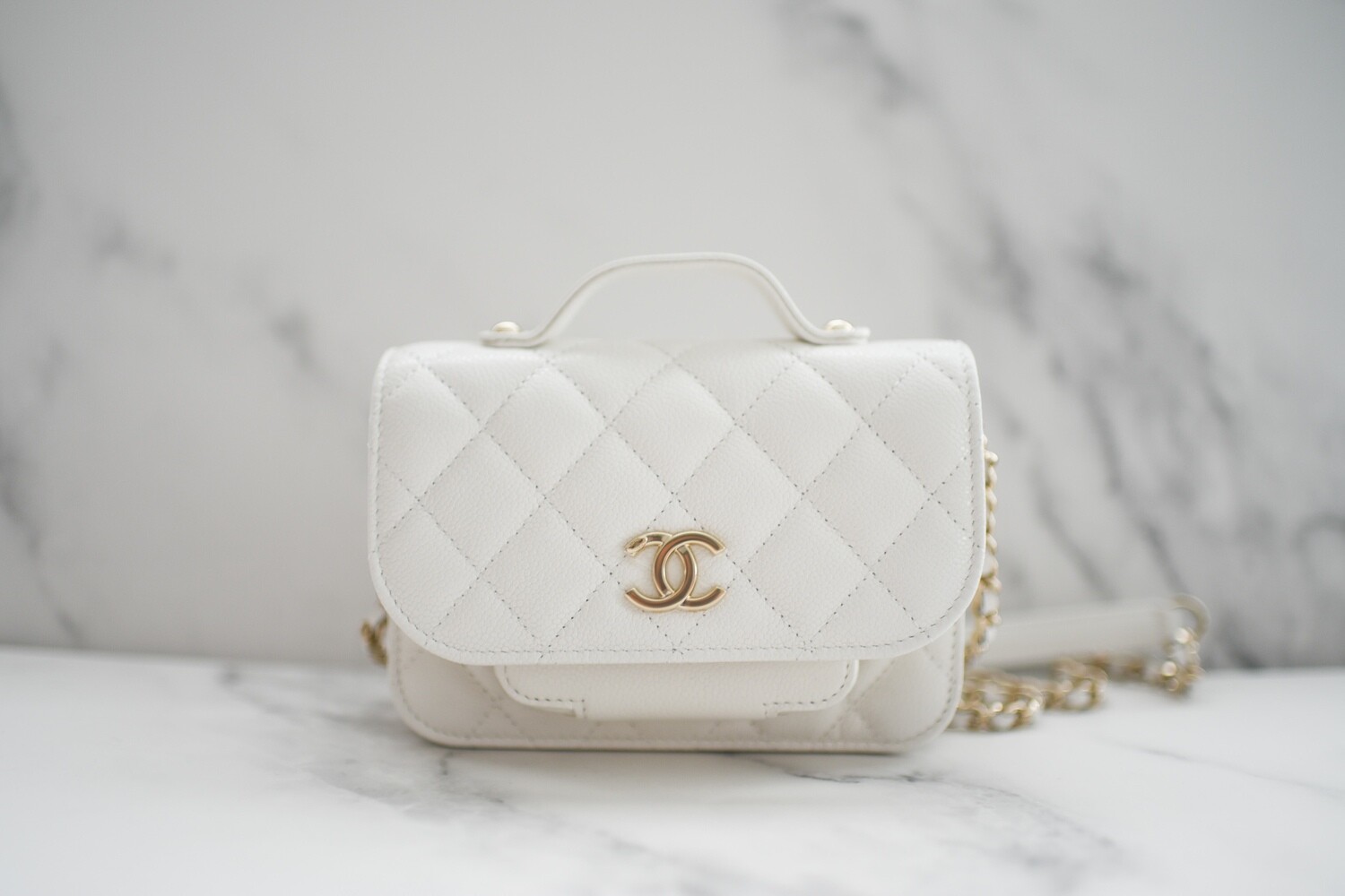white chanel clutch with chain