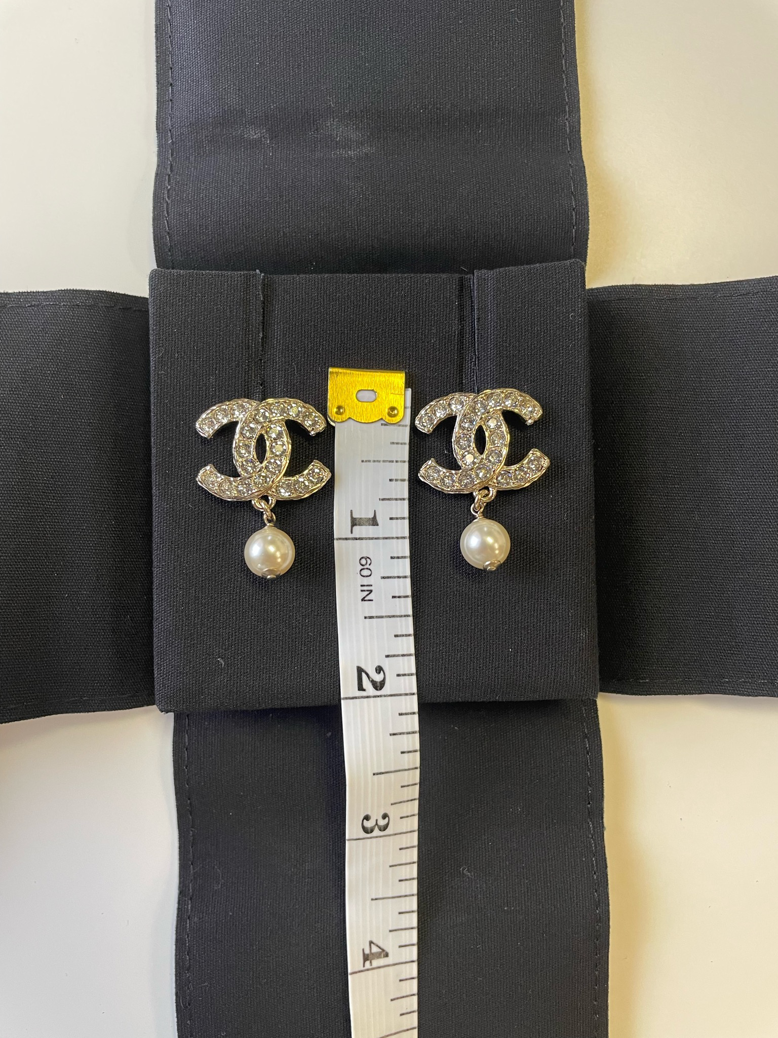 Chanel Earrings CC Ribbon Studs, Gold Hardware with Crystals, New in Box  MA001