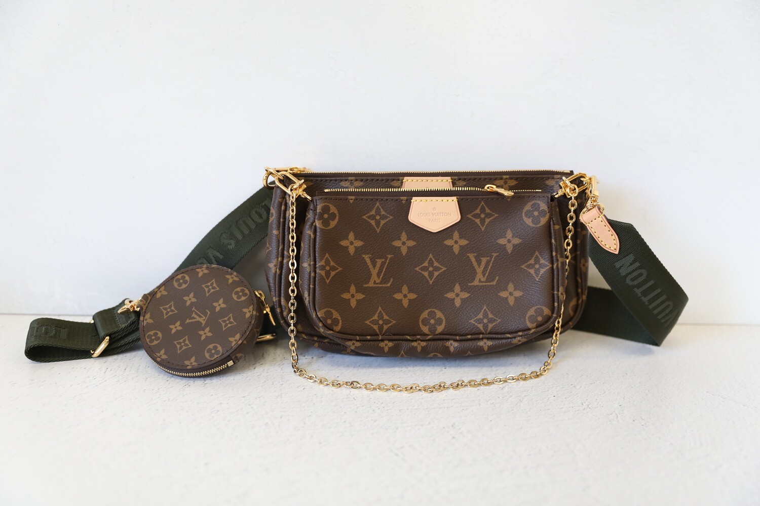 louis vuitton with green strap