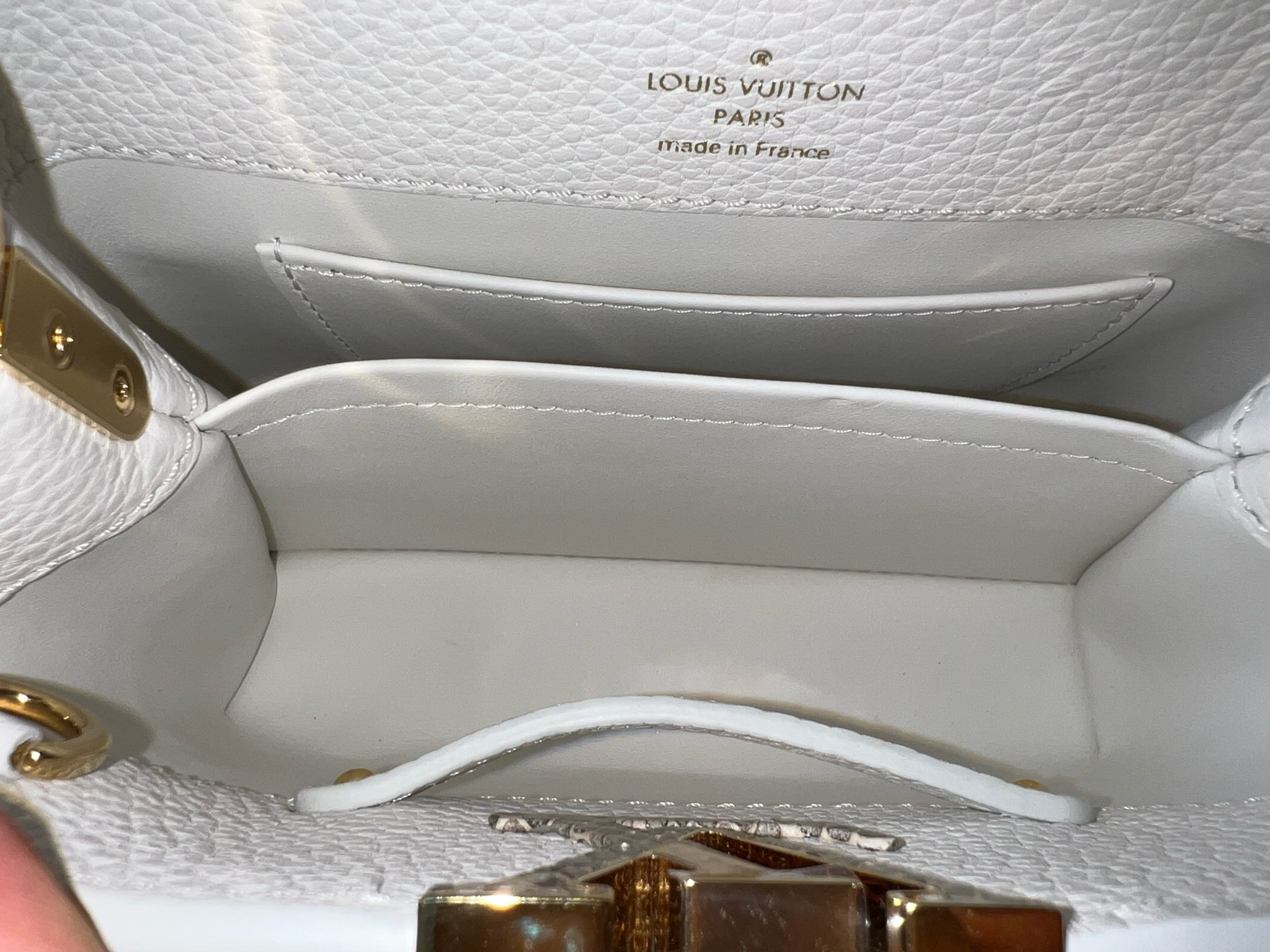 Sold at Auction: Louis Vuitton, Louis Vuitton Olympus/White Leather Capucines  Mini