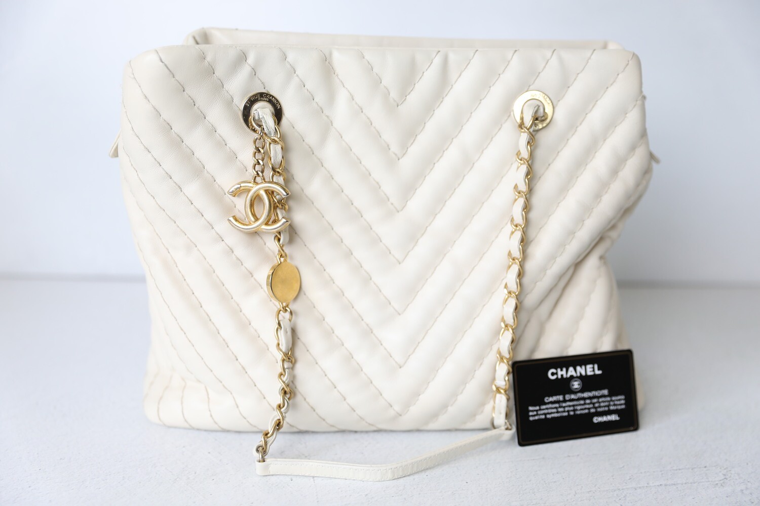 Chanel Shopping Tote, White Chevron with Gold Hardware, Preowned in Dustbag  WA001