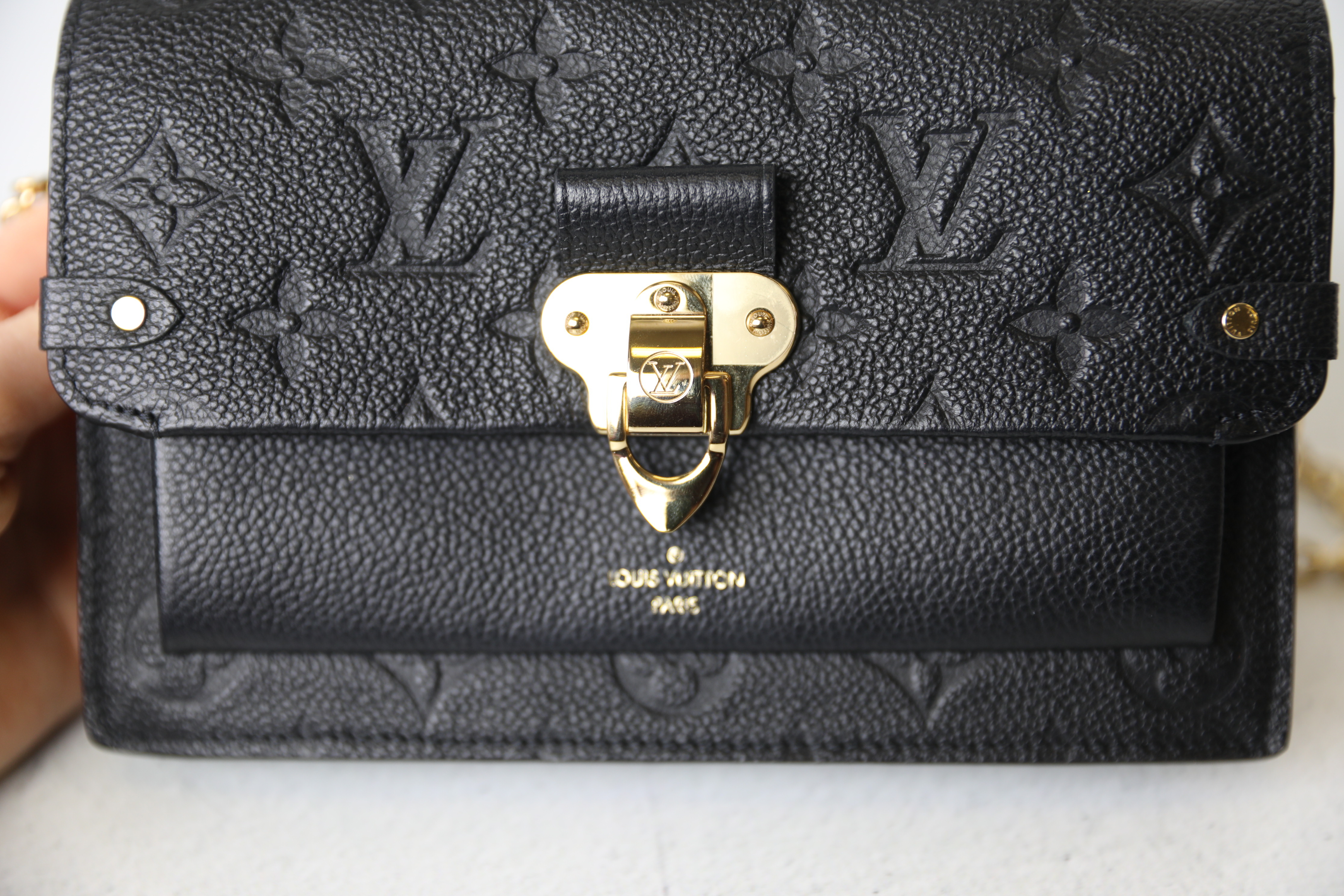 LV pochette Metis or Vavin PM - both in empreinte black leather