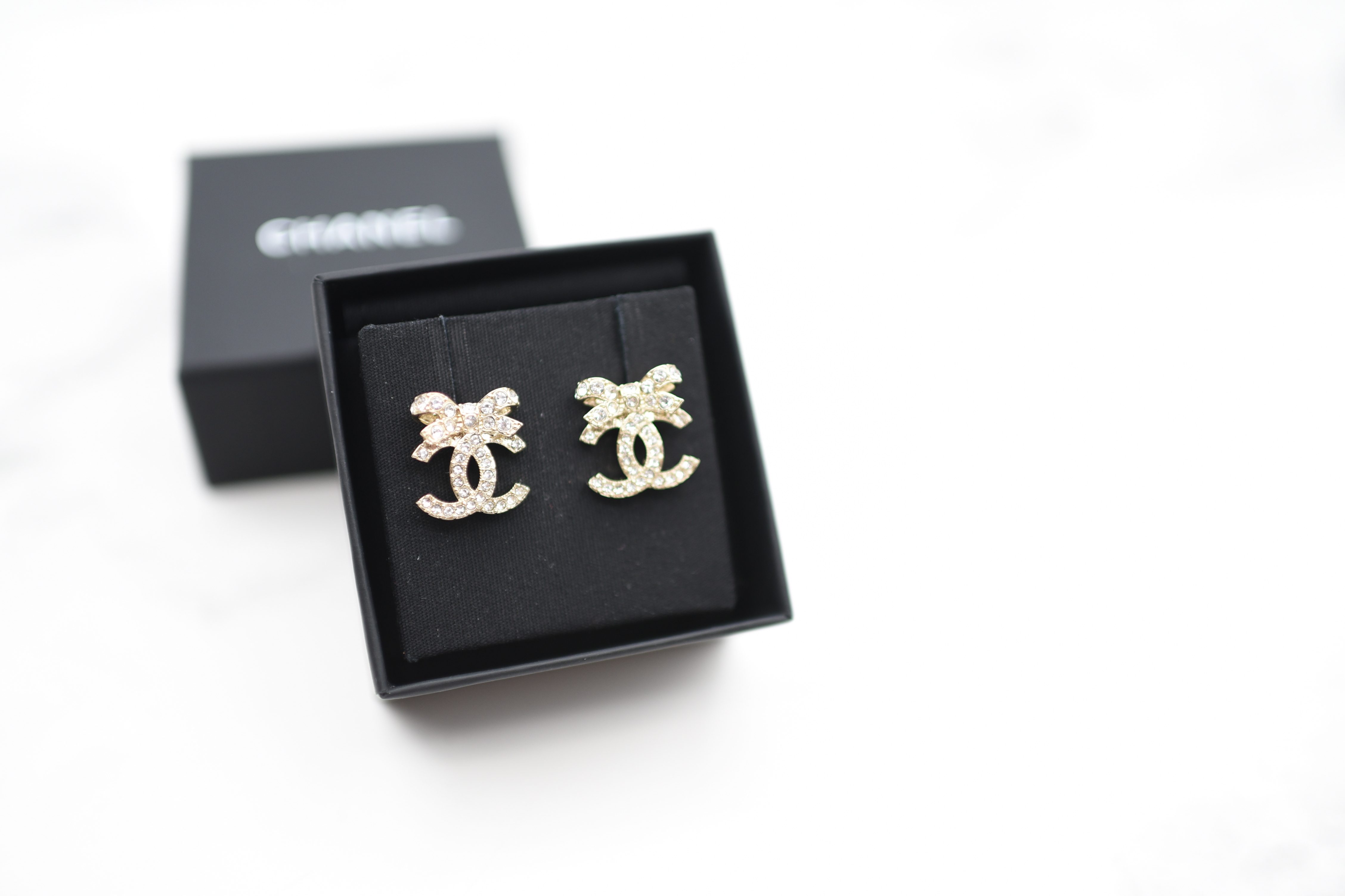 Chanel Earrings CC Ribbon Studs, Gold Hardware with Crystals, New in Box  MA001