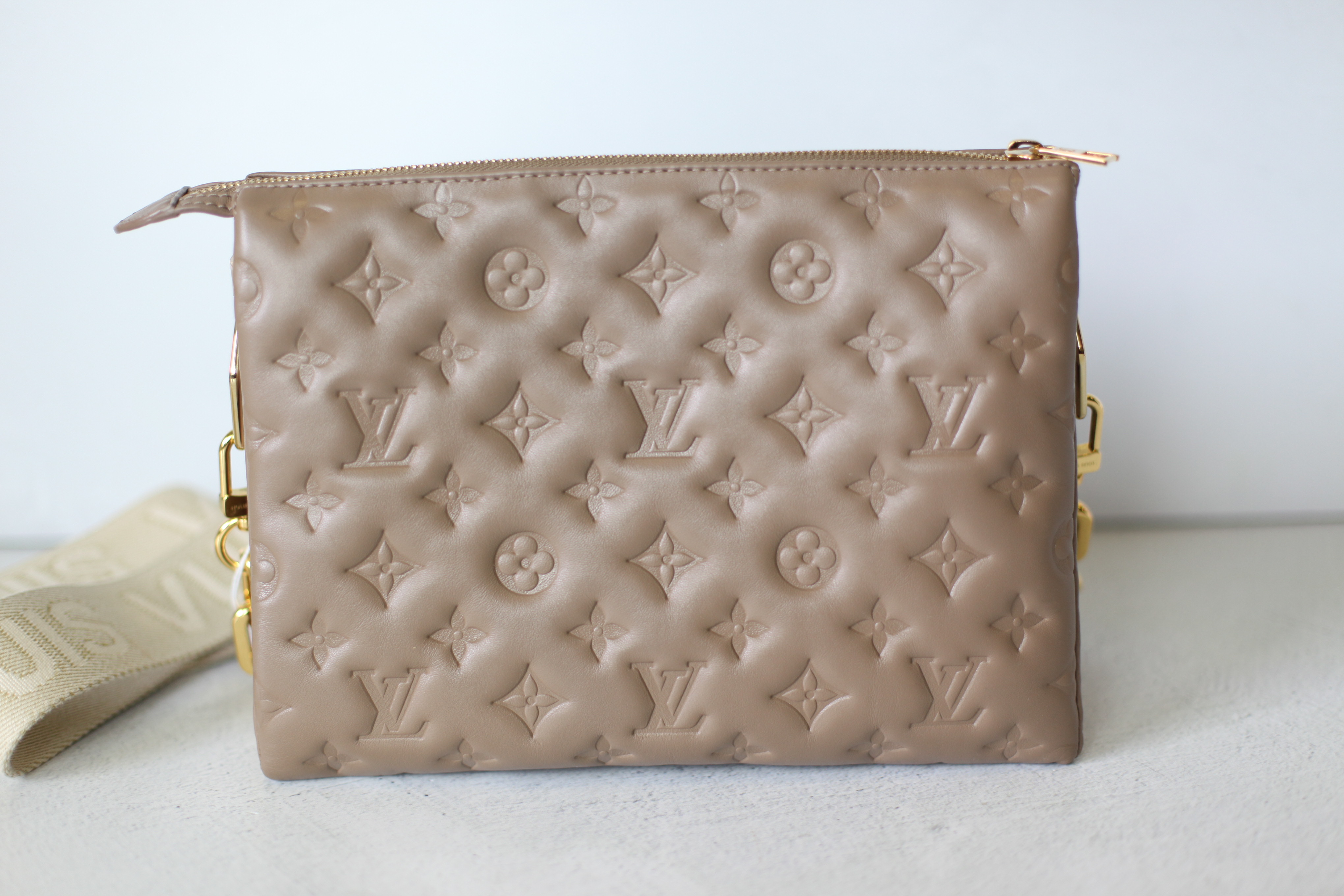 Louis Vuitton Pochette Coussin - Beige Monogram Embossed Leather. In Orig  Box.