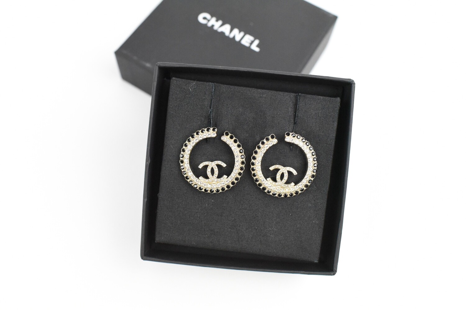 black and white chanel logo earrings