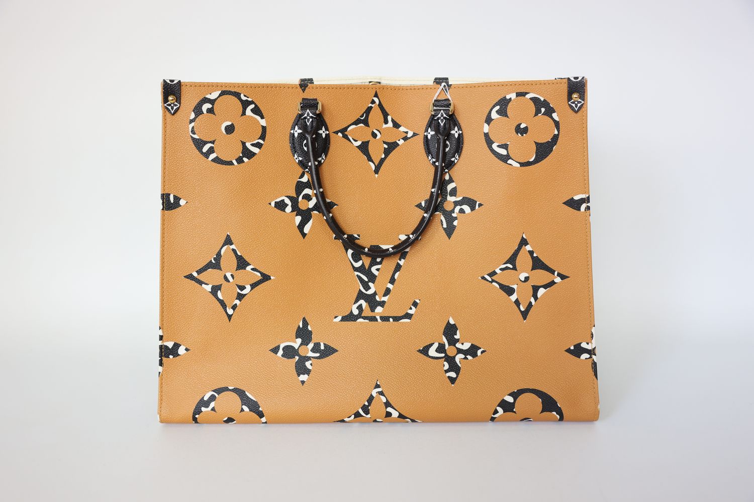 Louis Vuitton Jungle OnTheGo GM, Ivory, Brown, Black Giant Monogram and Animal Print Coated Canvas with Gold Hardware, Preowned in Box WA001