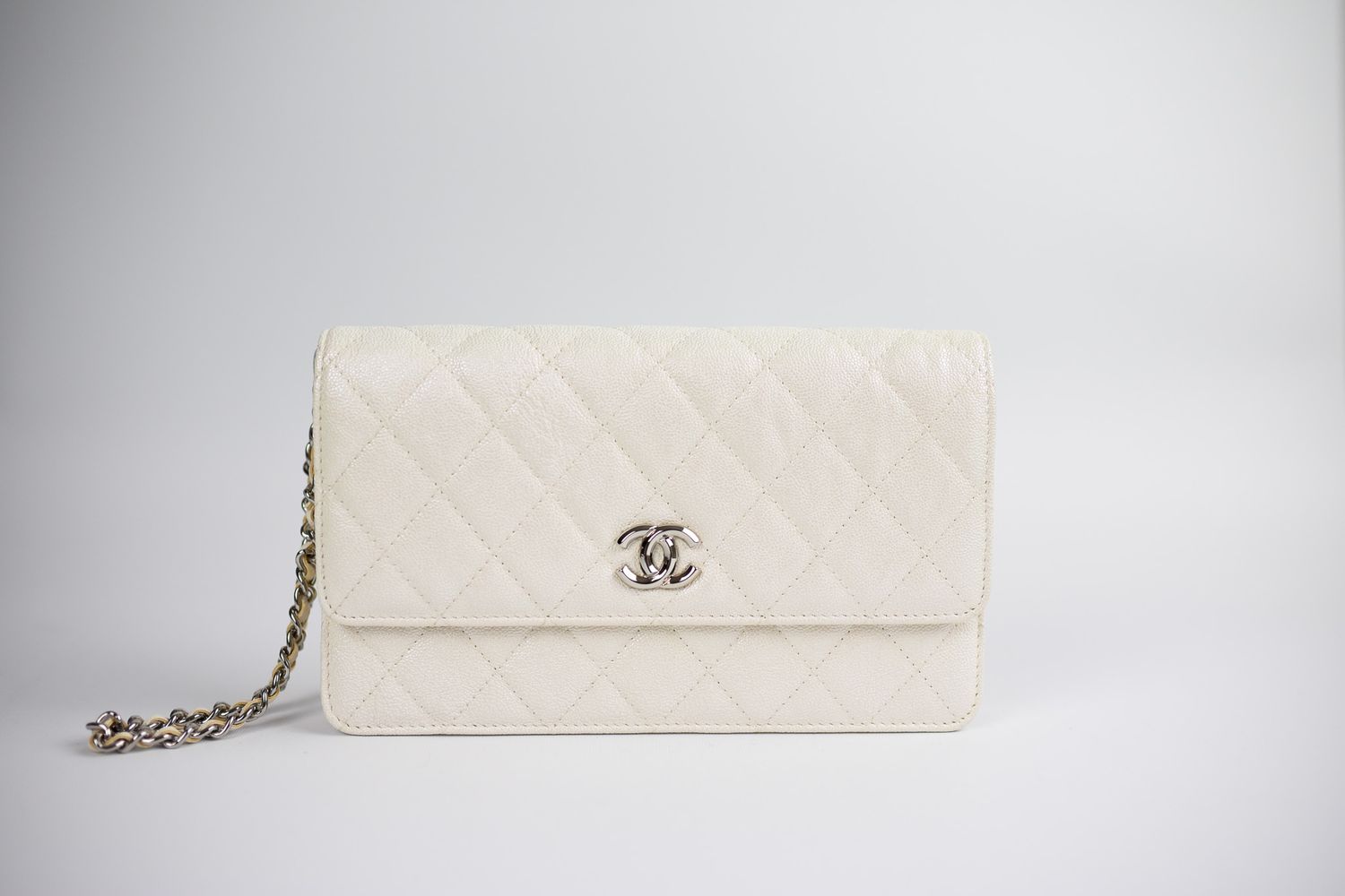 Chanel Clutch with Strap, White Iridescent Caviar Leather, Silver Hardware, Preowned in Dustbag GA001P