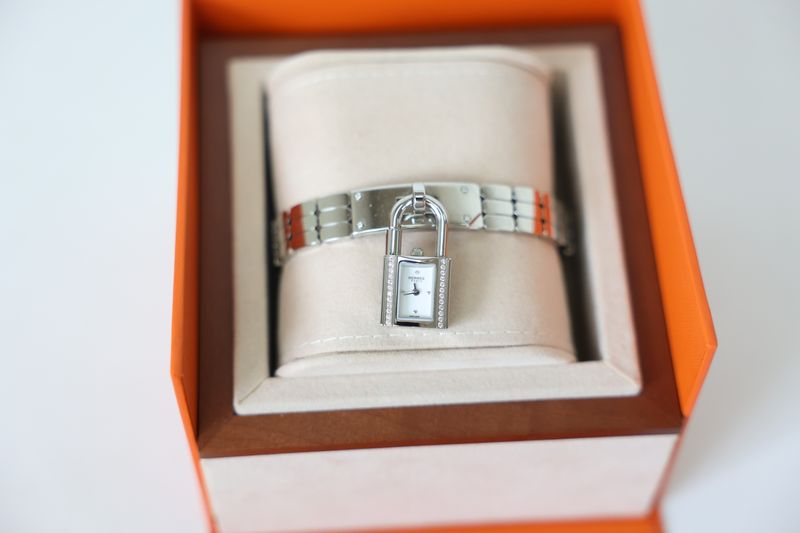 Hermes Kelly Watch Mini Model Size 16, Stainless Steel with Diamonds, Black Barenia Calfskin Lanyard, Preowned in Box WA001