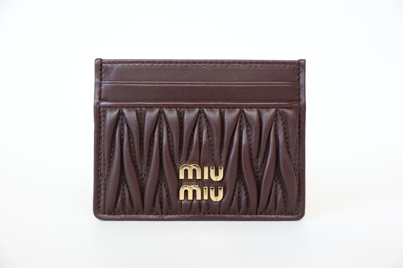 Leather wallet Miu Miu Brown in Leather - 56051638