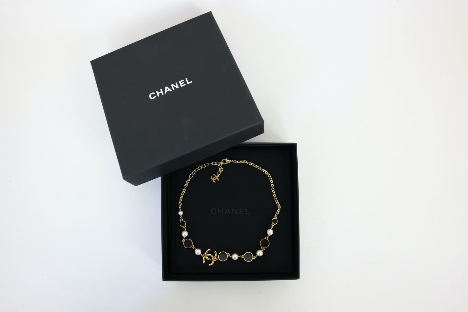 Chanel CC 24C Station Necklace, Gold Finish with Resin Pearl and Black Enamel, Preowned in Box WA001