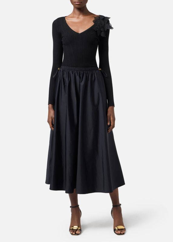 Gonna a ruota in vela tecnica con coulisse