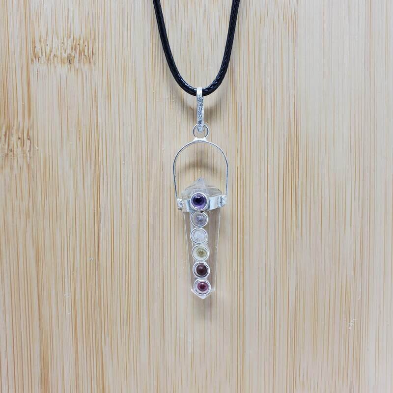 Double terminated clear quartz chakra necklace on black cord from Arkady’s Metaphysical Gifts