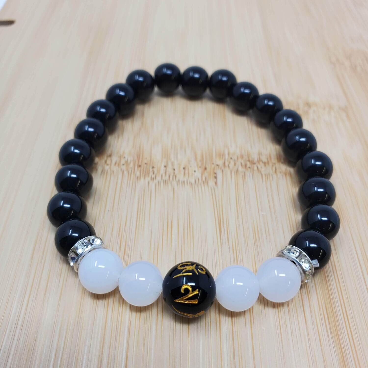 BLACK OBSIDIAN OM MANI BEAD BRACELET