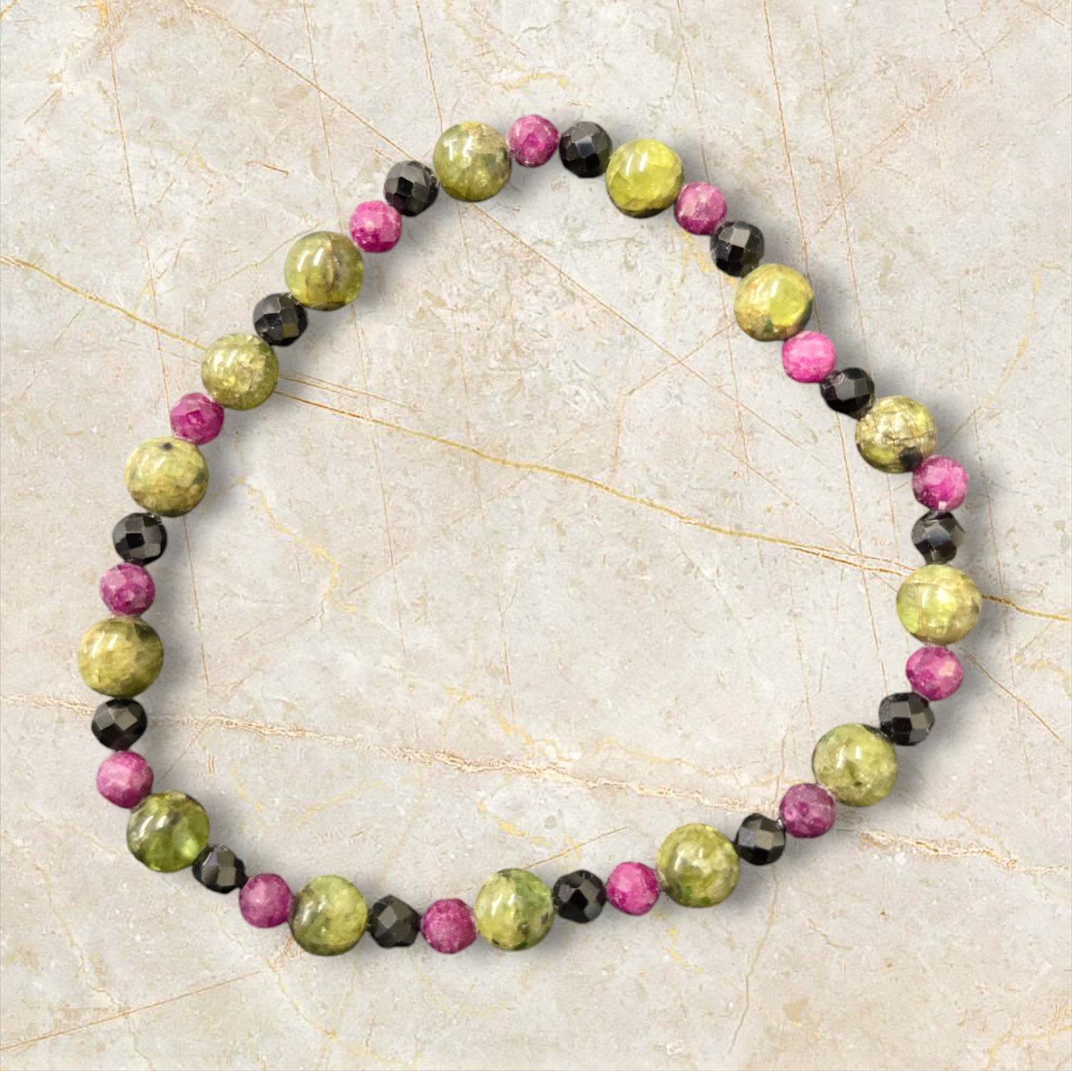 PERIDOT/RUBY/SPINEL 6-4MM BRACELET