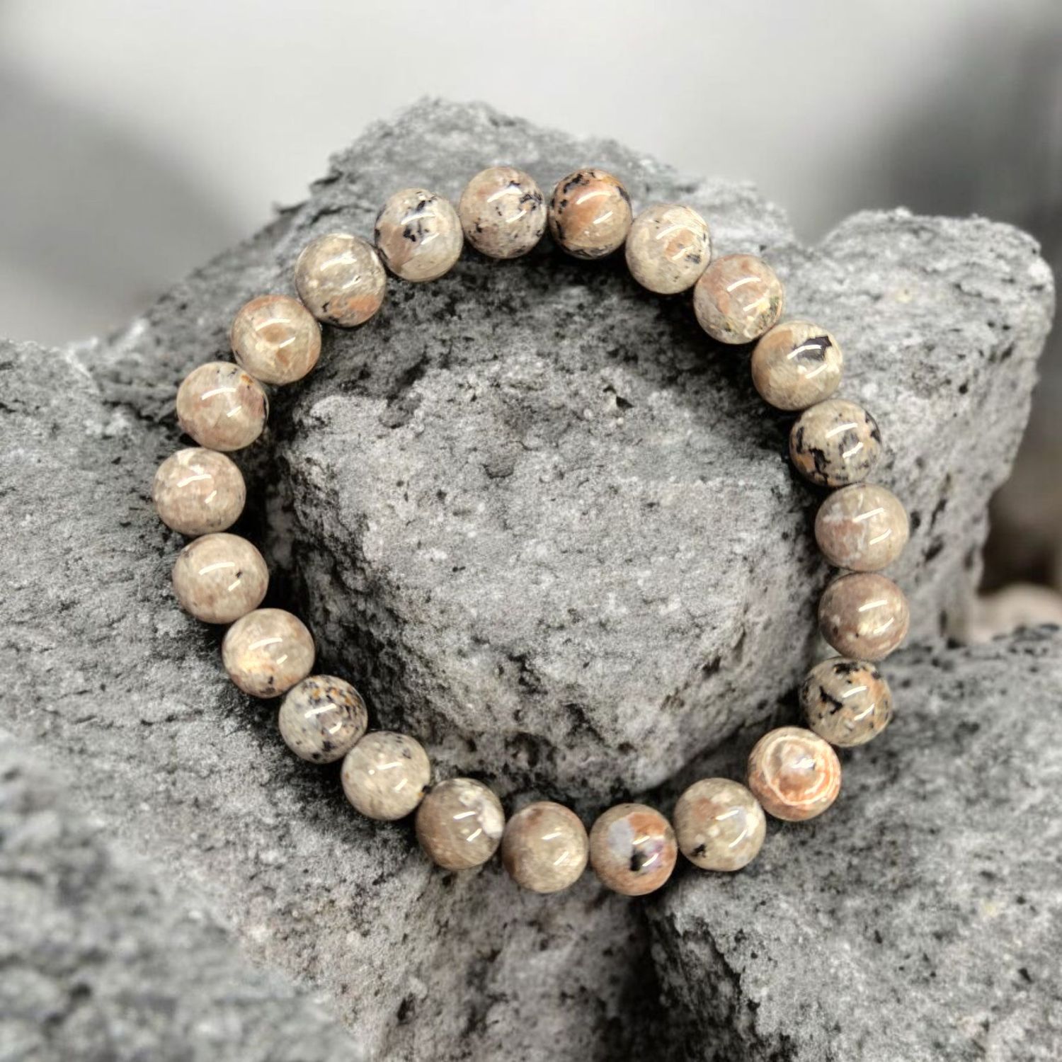 Yooperlite 8mm Stretchy Bracelet glowing under UV light – Arkady’s Body Adornment