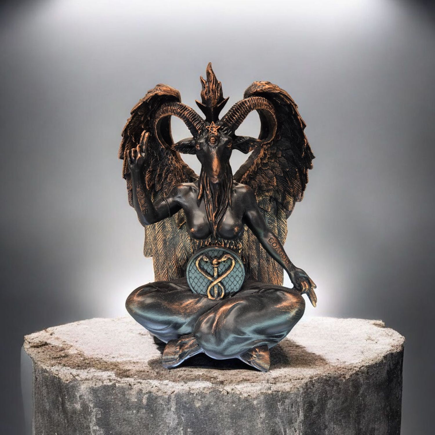 Bronzed Baphomet statue seated with wings and caduceus symbol, representing balance, duality, and occult wisdom.