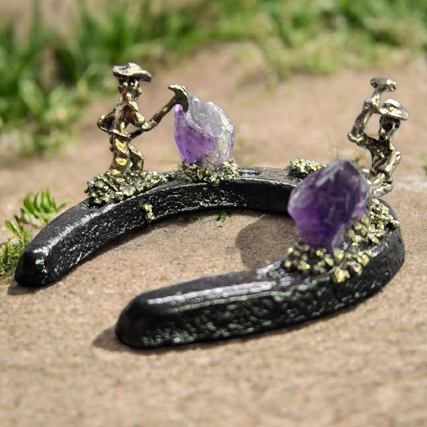 AMETHYST MINERS ON HORSESHOE Amethyst Miners on Horseshoe crystal display with raw amethyst and miniature mining figures