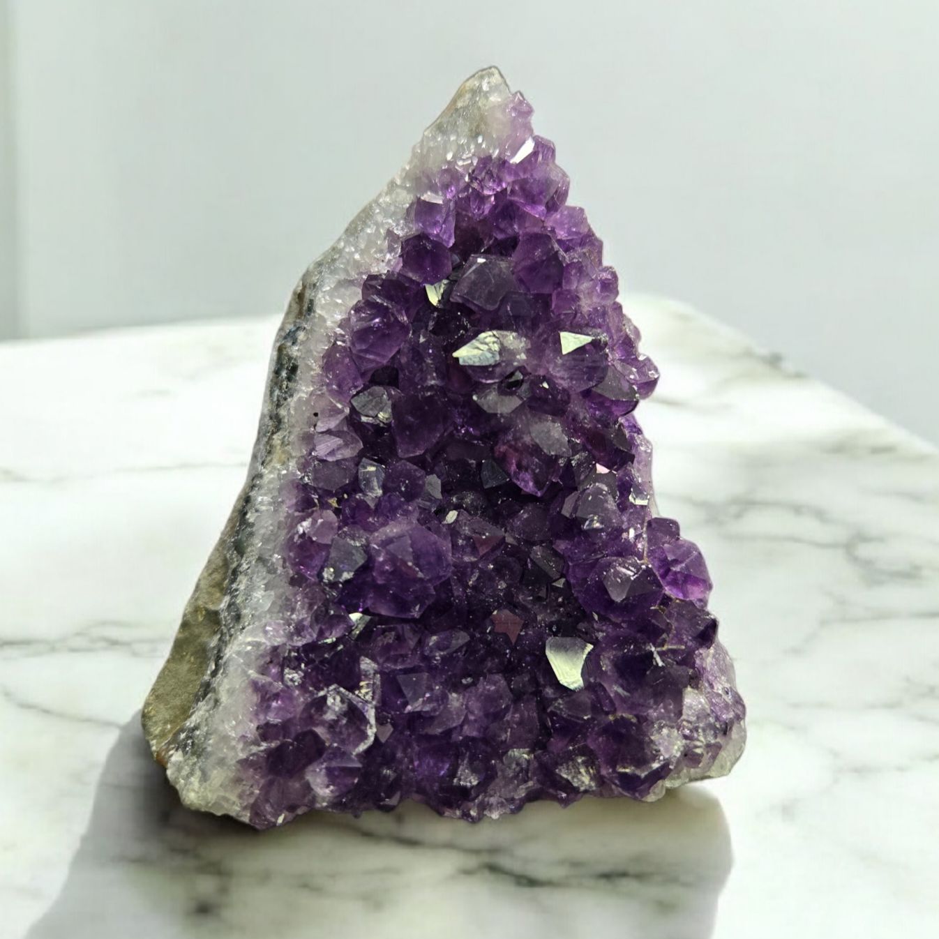 A+ URUGUAY AMETHYST DRUZY CUT BASE C A+ Uruguay Amethyst druzy cut base with deep purple crystal points standing display stone