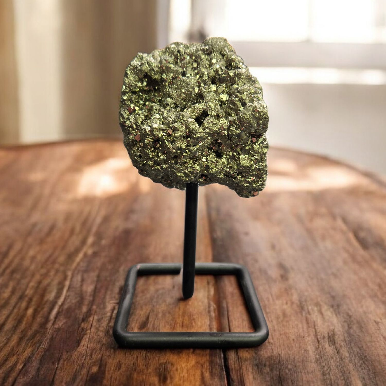 Mounted pyrite crystal on metal stand with natural golden cubic formations