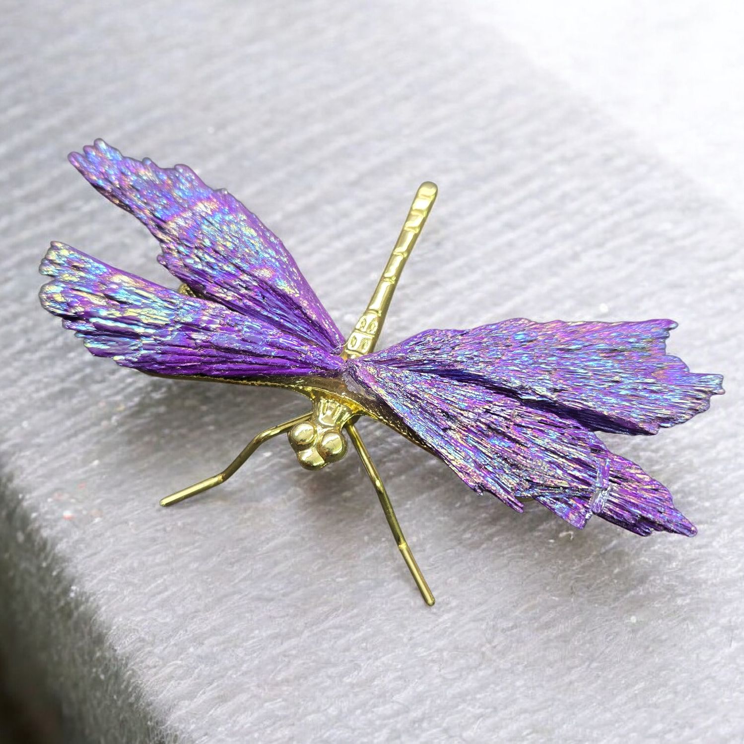 Purple aura kyanite dragonfly crystal with iridescent wings