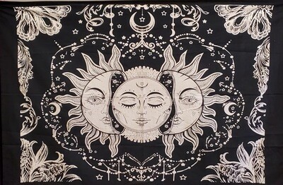 Mystical sun and moon tapestry featuring celestial faces, stars, and sacred cosmic symbolism on black fabric for meditation.