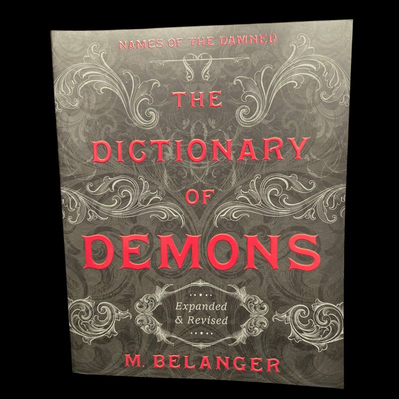 Dictionary of Demons Expanded and Revised by M. Belanger, a 494-page occult and demonology reference book
