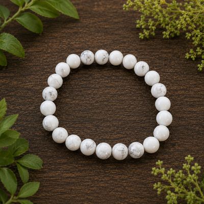 White howlite 8mm gemstone bracelet with natural gray veining.