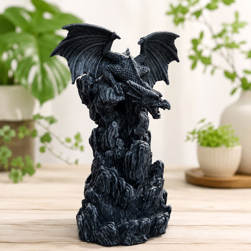 Grey Dragon Back Flow Burner on wooden table.