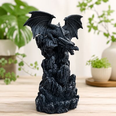 Grey Dragon Back Flow Burner on wooden table.