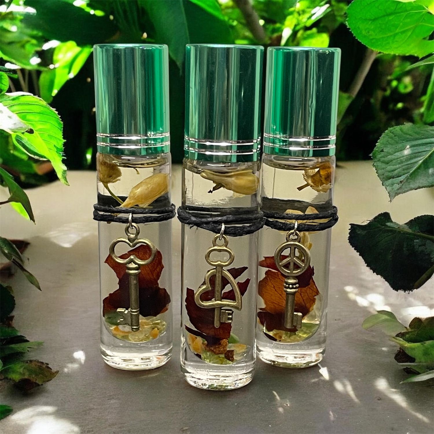 Keys ritual roll-on oil with key charm for luck and prosperity handcrafted by The Lady Arkady Amarillo Texas