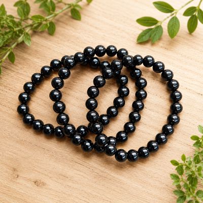 Multiple polished black onyx 8mm stretch bracelet with glossy round gemstone beads