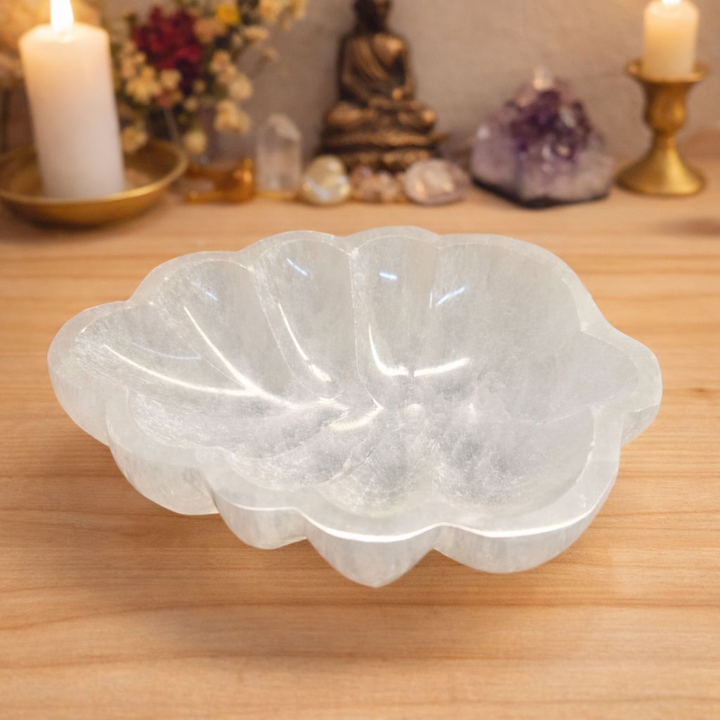Large selenite leaf bowl crystal charging dish on wooden altar Arkadys Metaphysical Gifts Amarillo TX