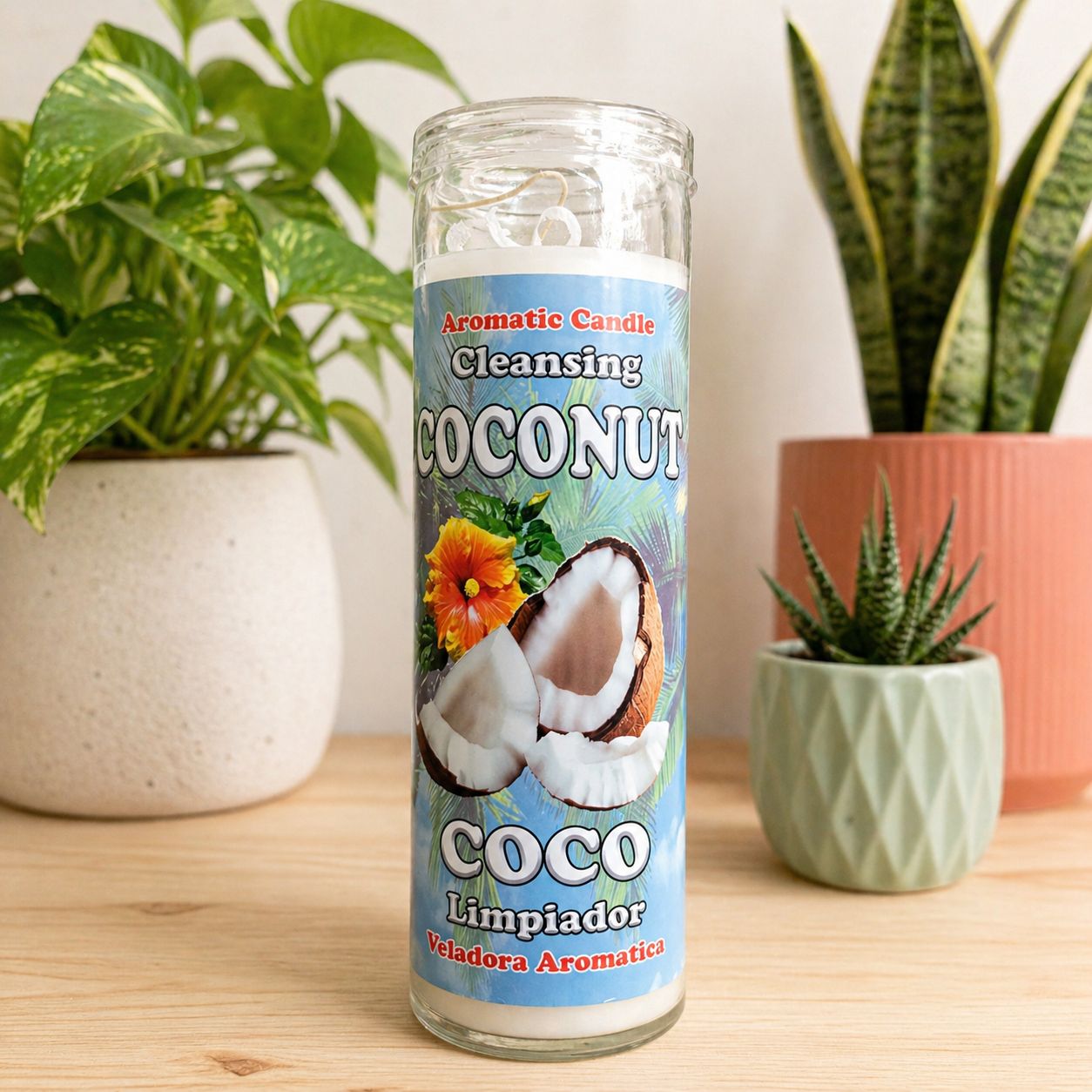 Coconut cleansing ritual candle with coconut flakes at Arkadys Metaphysical Gifts Amarillo, Texas.