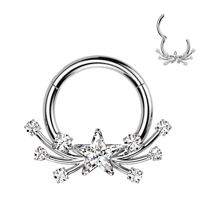 Close-up of implant grade titanium Star Bright hinge segment ring with sparkling CZ star and accent stones.