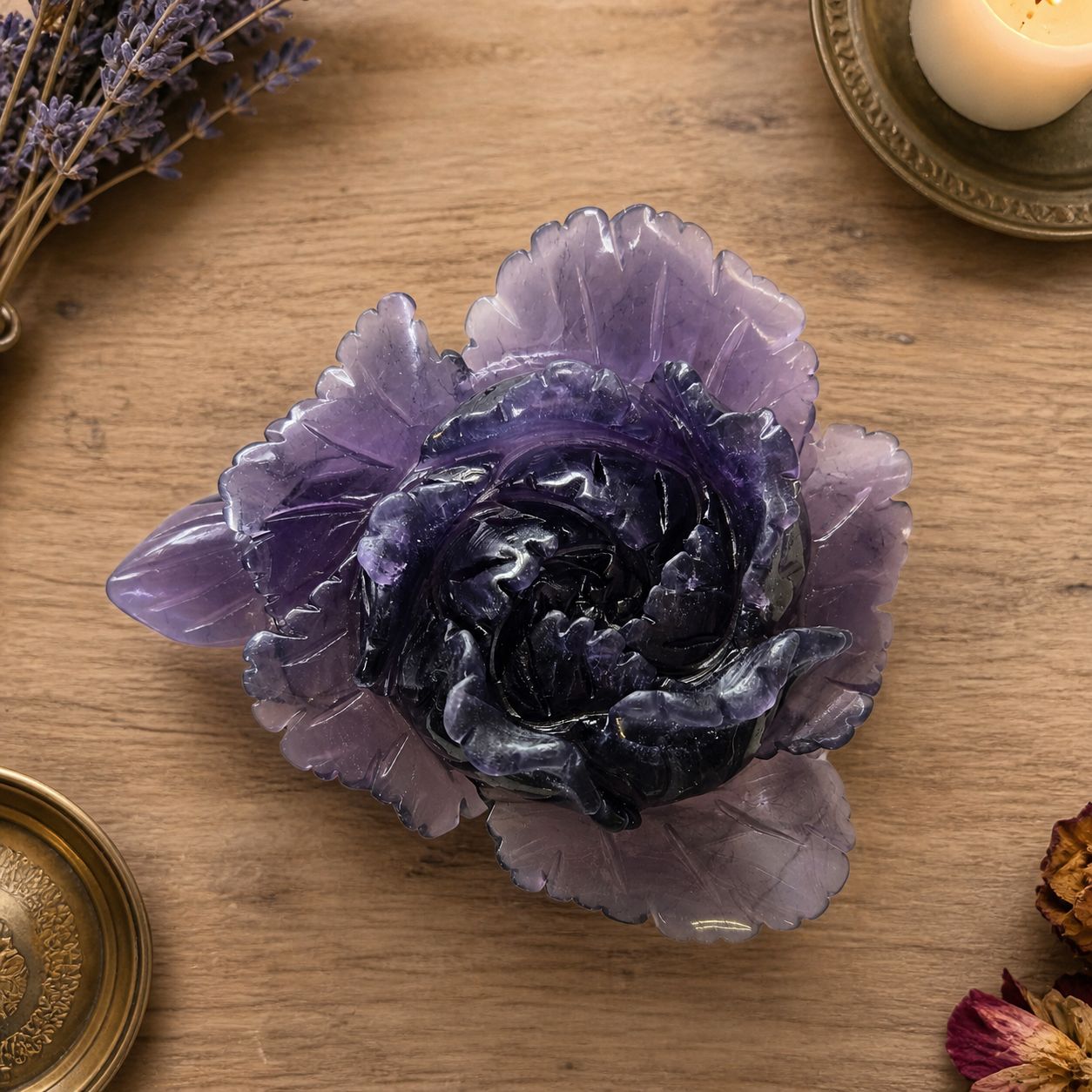 Purple fluorite flower carving on wooden altar table Arkadys Metaphysical Gifts Amarillo Texas