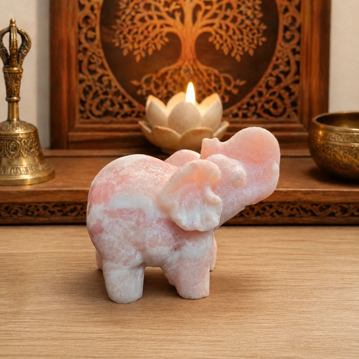 Side 1 of Carved pink opal elephant crystal on wooden altar Arkadys Metaphysical Gifts Amarillo