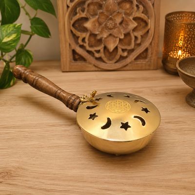 Star and Moon brass incense burner with Flower of Life lid and wooden handle on altar table at Arkadys Metaphysical Gifts