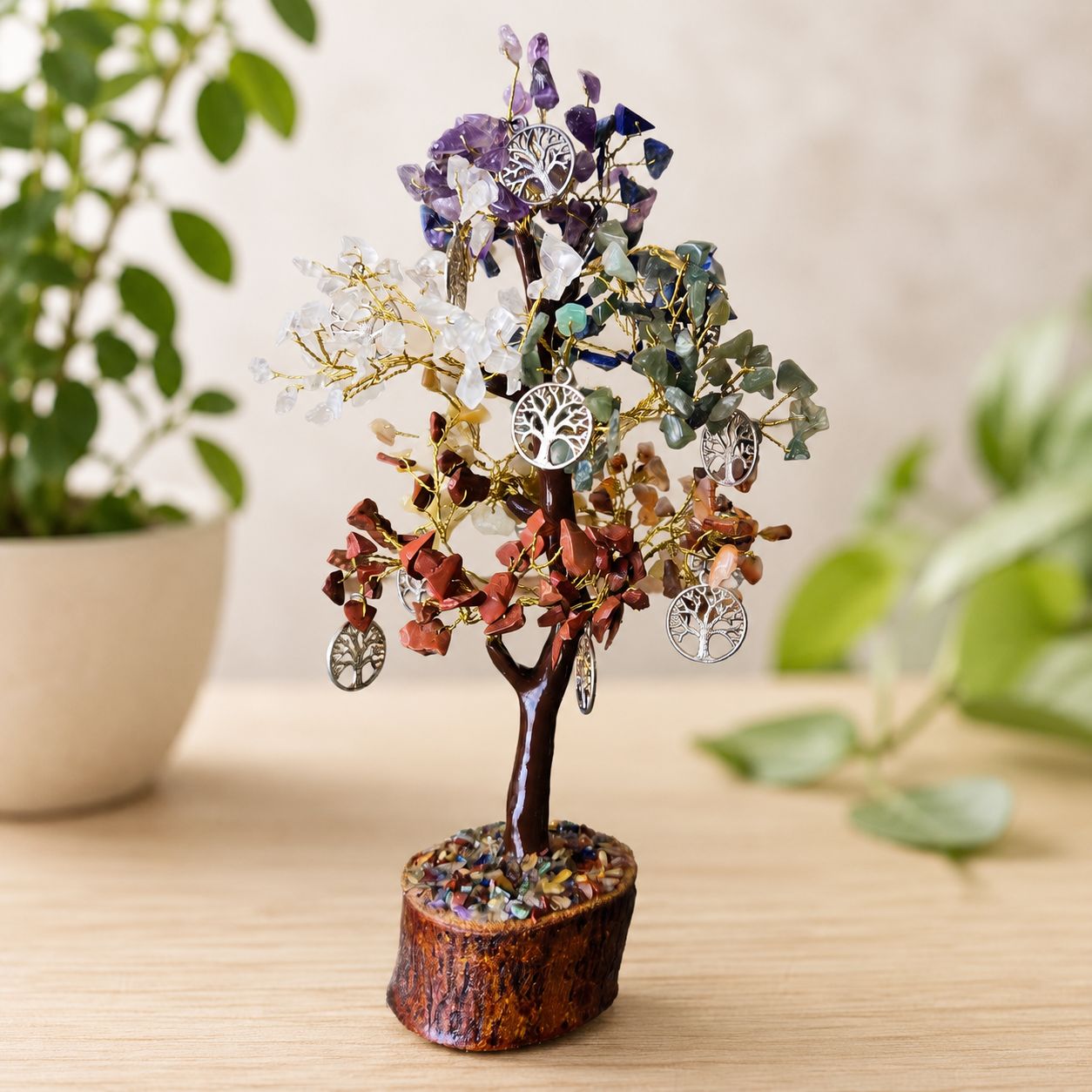 Tree of Life charms gemstone tree with genuine crystal chips on a natural wooden base.