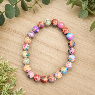 Colorful Mojave Jasper 8mm stretch bracelet with pink, purple, blue, red and cream marbled beads.